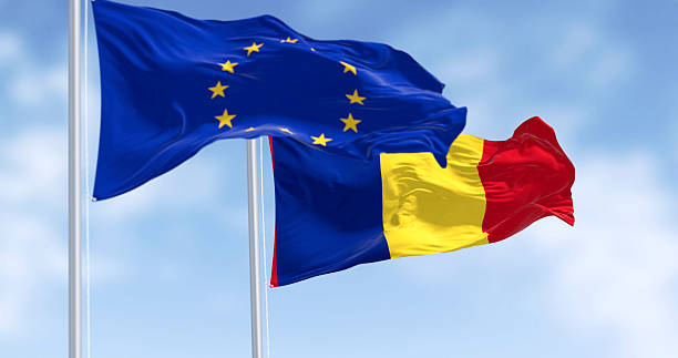 istock Romania and EU flags waving together on flagpoles, 3D render, diplomacy 2206690460