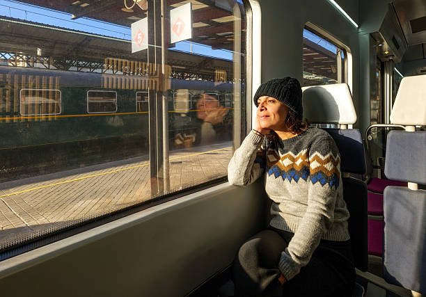 istock Passenger enjoying a scenic train ride. 2206691270