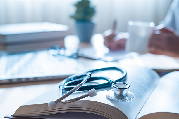 istock Stethoscope, Health and Wellness:Medical Researcher Analyzing Data For Breakthroughs In Healthcare Solutions. Medical research. Health and medicine concept. 2206693075