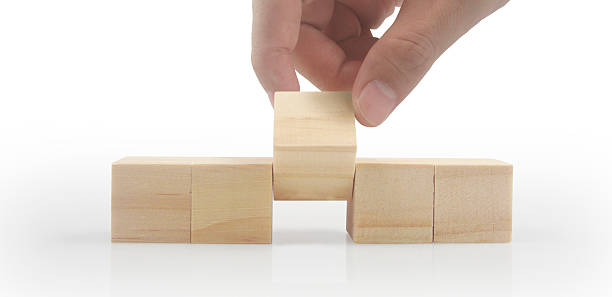 istock Wooden cubes in hand with copy space for input wording 2206693418