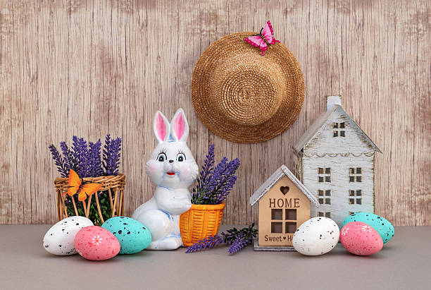 istock Easter bunny and basket with lavender bouquet. 2206696127