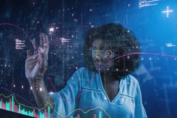 istock Woman wearing futuristic smart glasses interacting with a virtual data interface 2206696240