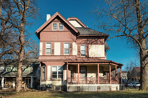 Large house with porch in Ann Arbor Michigan USA on a sunny day.