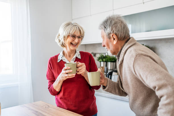 istock Senior couple drinking coffee in the morning 2206701125