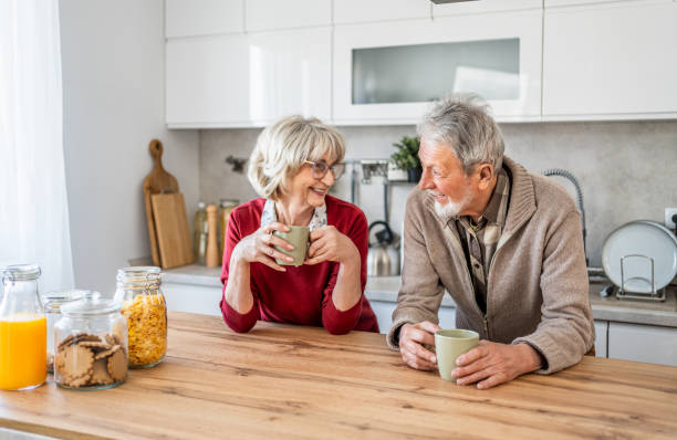 istock Senior couple drinking coffee in the morning 2206701155