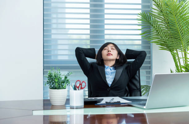 istock Businesswoman taking a break in office 2206704137