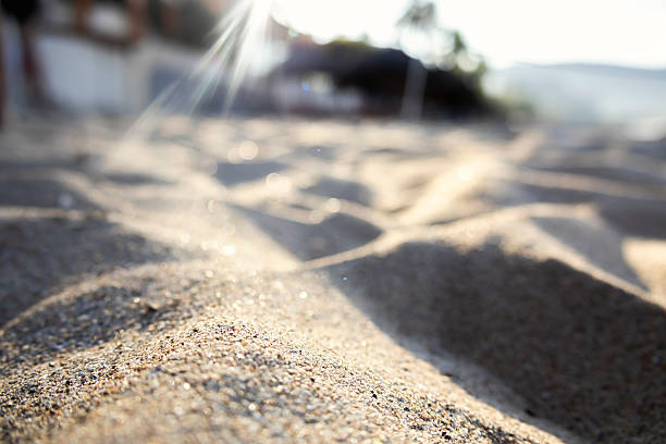 Pov watching the sand glitter on the beach