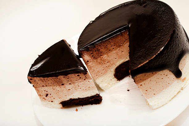 istock Coffee and milk cheesecake. A cake with cheese and chocolate on a plate. 2206705991