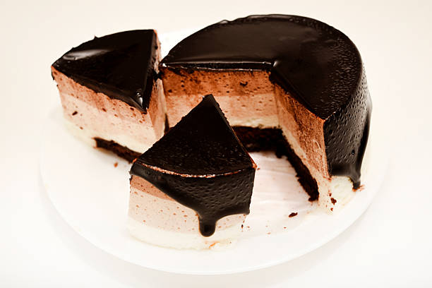 istock Coffee and milk cheesecake. A cake with cheese and chocolate on a plate. 2206706033