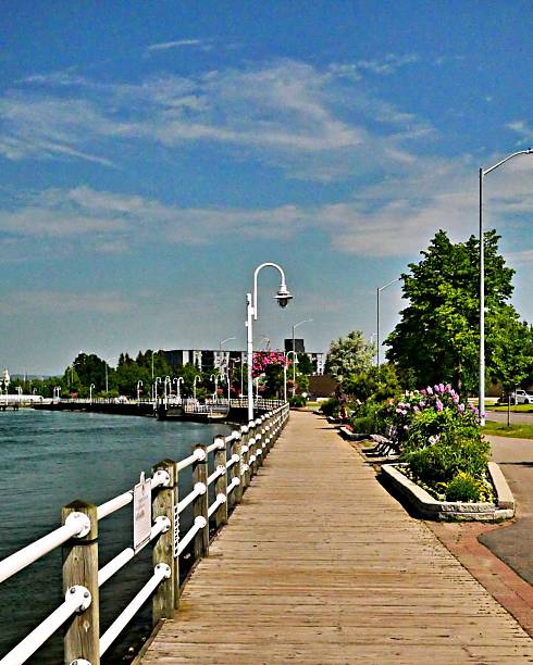 istock A boardwalk along the river in the city 2206710543