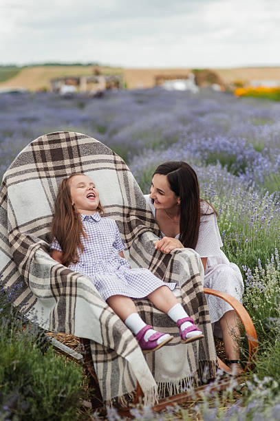 istock Aromatherapy for mother and daughter in a lavender field. 2206712867