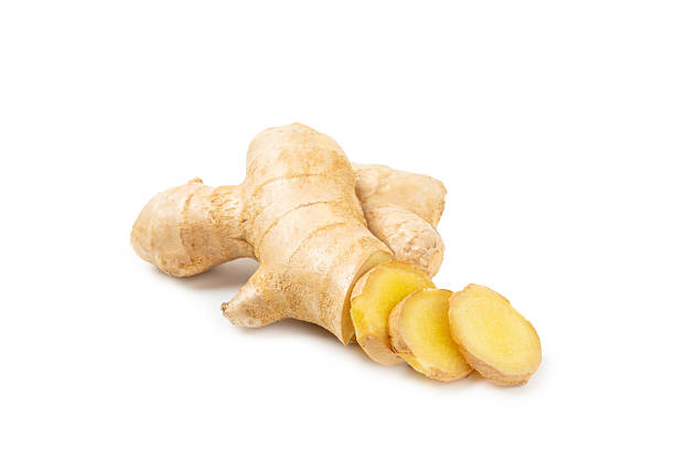 istock Fresh ginger and lemon isolated on white background. Sliced ​​ginger. Ginger root. Traditional alternative medicine, healing tea for immunity. Close-up. 2206714137