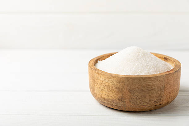 istock Aromatic vanilla sugar. Vanilla pods. Vanilla sticks, brown and white sugar in a bowl on a textured background. Vanilla flowers, spices and herbs for desserts and baking. Space for text. Copy spac 2206715151