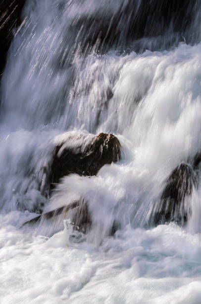 istock Creek Cascading Over Creek Rocks 2206718740