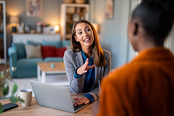 istock Diverse Businesswomen Share Laughs During Remote Work Meeting 2206722299