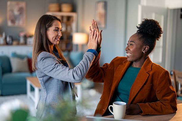 istock Cheerful Colleagues Working Together in a Cozy Indoor Setting 2206722321