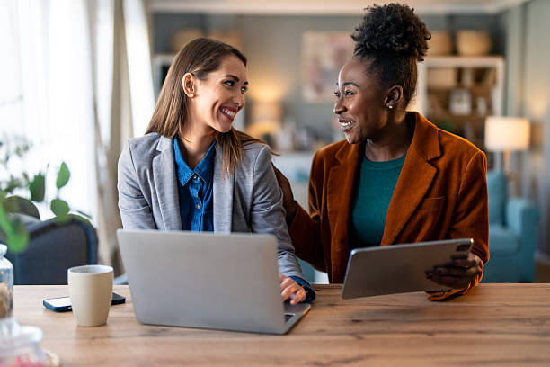 istock Professional Women Collaborating in Bright Home Office 2206722635
