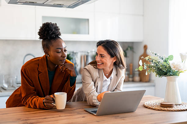 istock Professional Women Collaborating in Bright Home Office 2206723026