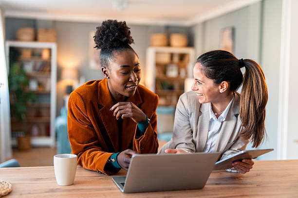istock Collaborative Entrepreneurs Discuss Startup Plans in Bright Home Office 2206723099