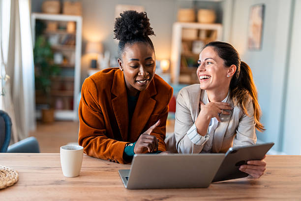 istock Diverse Female Entrepreneurs Collaborating at Home Office 2206723109