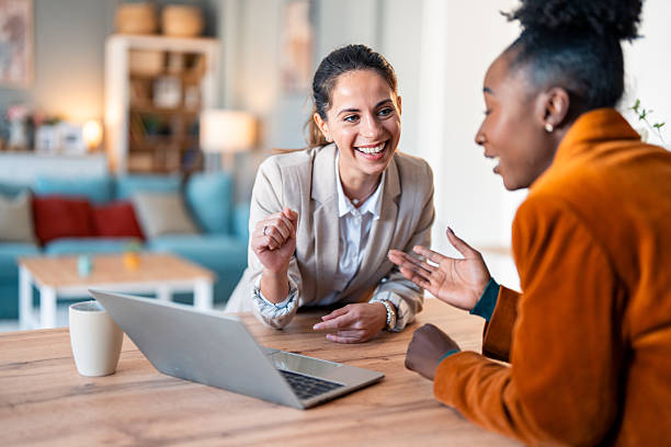 istock Diverse Business Women Sharing Joyful Moment During Remote Meeting 2206723122
