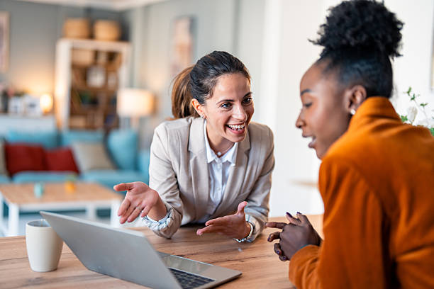 istock Professional Women Collaborating in Bright Home Office 2206723583