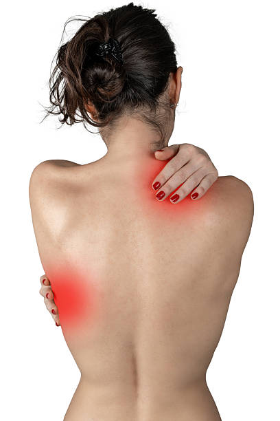 Woman suffering from shoulder pain