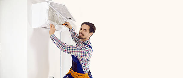 istock Copy space banner background with happy technician who is fixing wall air conditioner 2206727143