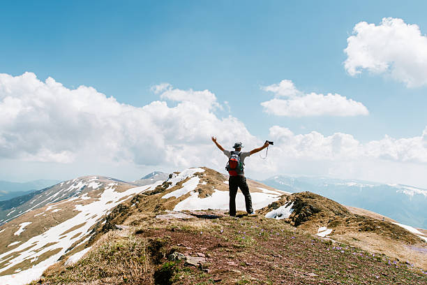 istock A photographer hiker stands at a scenic viewpoint 2206731010