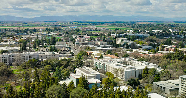 Aerial shot of University of California campus buildings in Davis on a sunny day in spring.