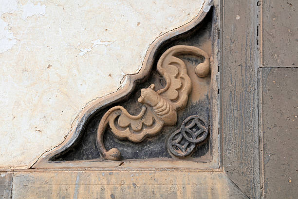 istock bat carvings on the wall in a temple, China 2206747165