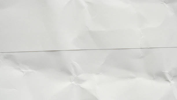 istock Abstract white crumpled and creased recycle paper texture background 2206747289