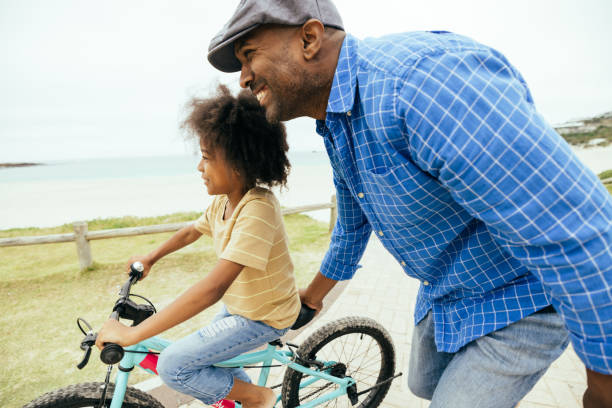 istock Energetic Family Fun on the Shoreline 2206747949