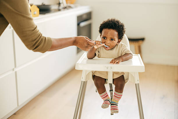 istock How to Make Your Baby's First Solid Food Experience Enjoyable and Healthy 2206755656
