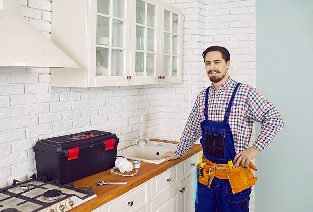 istock Portrait of happy plumber pose in client home 2206760205