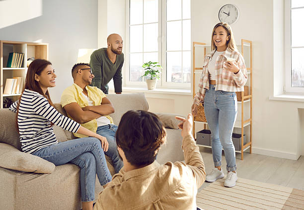 istock Diverse group of happy young people having fun during a friendly gathering at home 2206761794