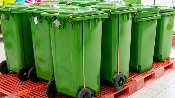 istock Rows of plastic trash cans. Plastic trash can. Trash can. Garbage bin display 2206768380