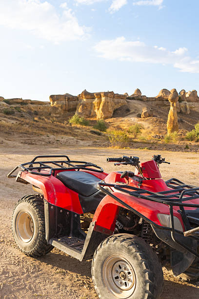 istock Red quad bikes parked on dusty trail in Cappadocia, Turkey 2206770726
