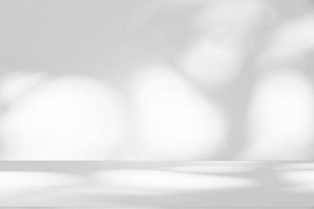 istock Wall interior background, studio and backdrops show products.with shadow from window color white . background for text insertion and presentation product 2206772389
