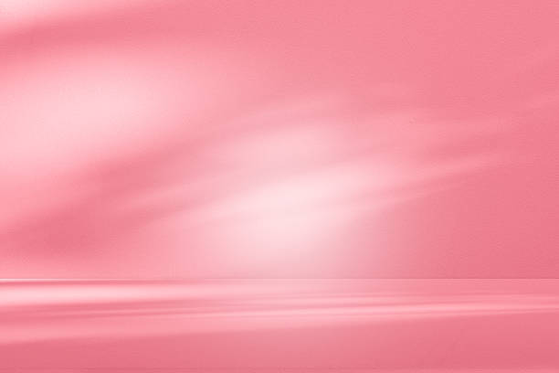 istock Wall interior background, studio, and backdrops show products. with shadow from window color white and pink light. background for text insertion and presentation of product 2206772394