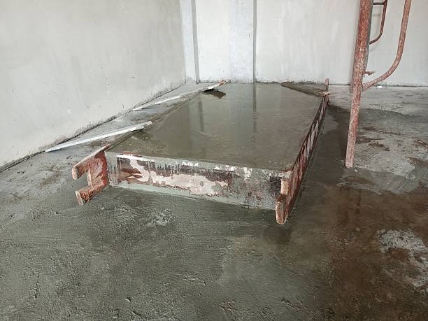 istock a freshly cast concrete foundation that will be used for the generator engine mount. 2206781352