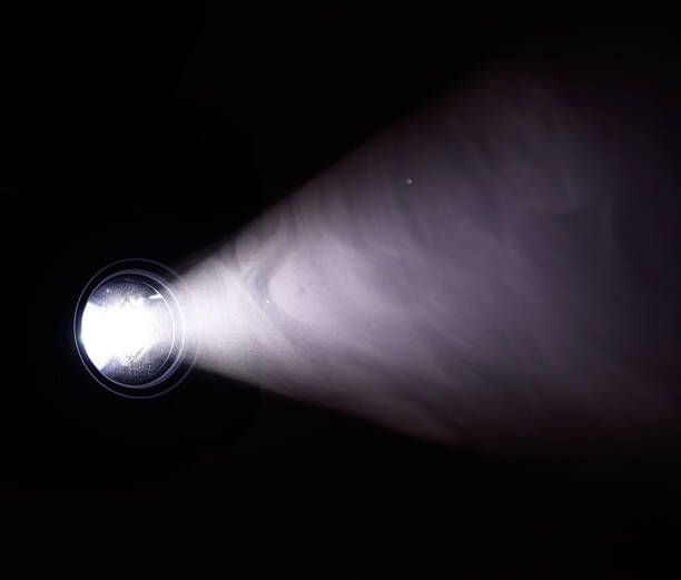 istock A light is shining on a dark background, creating a sense of mystery 2206782368