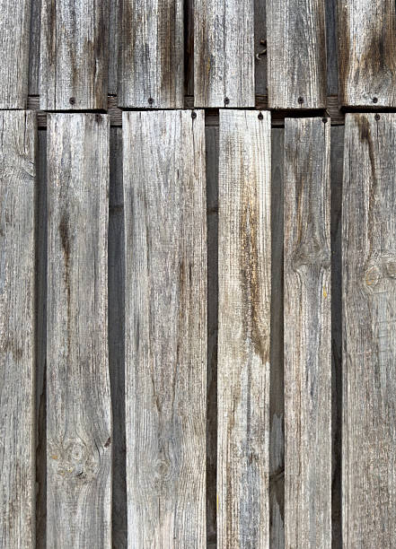 Distressed wood vertical slats background.