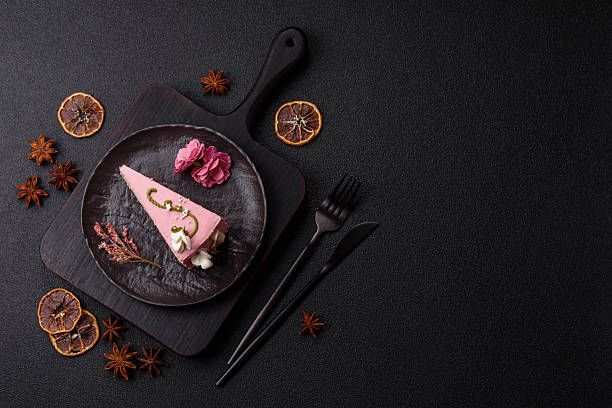 istock A piece of pink layered cake with strawberry flavor 2206782995