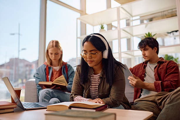 istock Multiracial group of students learning at college campus. 2206790355