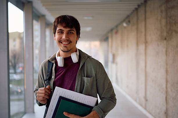 istock Portrait of happy student looking at camera 2206790685