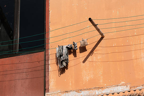 A pair of shoes hanging on a telephone wire.