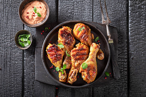 istock Hot grilled chicken leg as summer snack for bbq. 2206793214