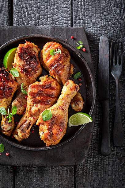 istock Spicy grilled chicken leg as a summer dinner. 2206793257