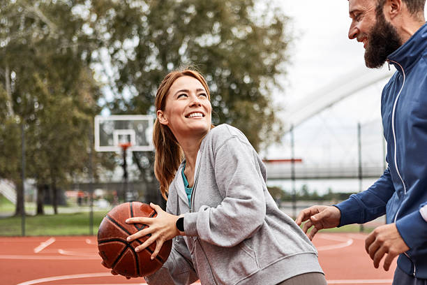 istock Couple Playing Basketball and Having Fun 2206795047